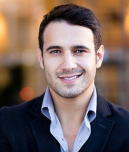 man smiling with dental implants