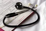 Stethoscope on top of forms